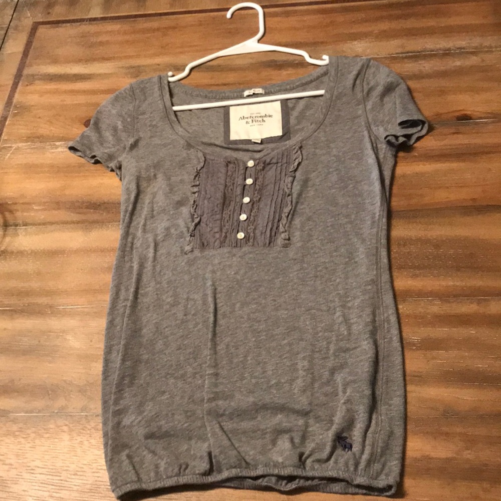 gray tight fitted blouse